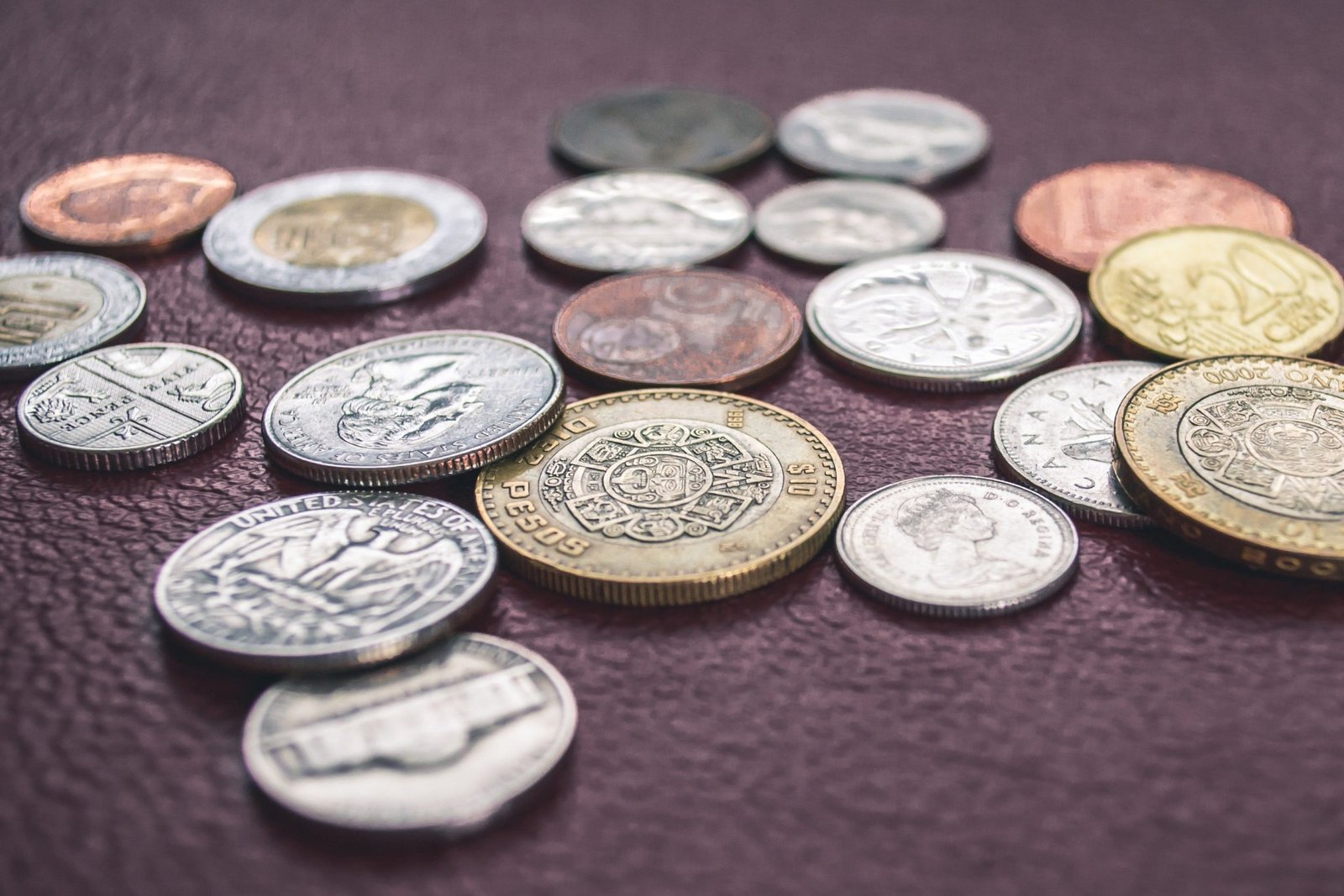 various coins on table Private Loan Lenders UK