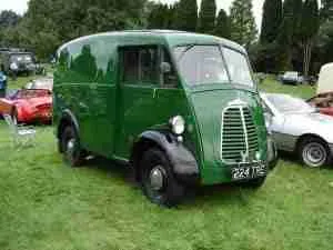 Classic green vintage panel van displayed at an outdoor car show, showcasing automotive history and design. cheap car finance bad credit