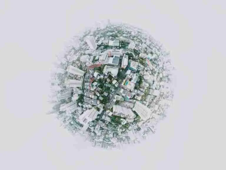 A tiny planet view of an urban landscape, showcasing a 360-degree spherical panorama of city buildings and streets. nationwide loans