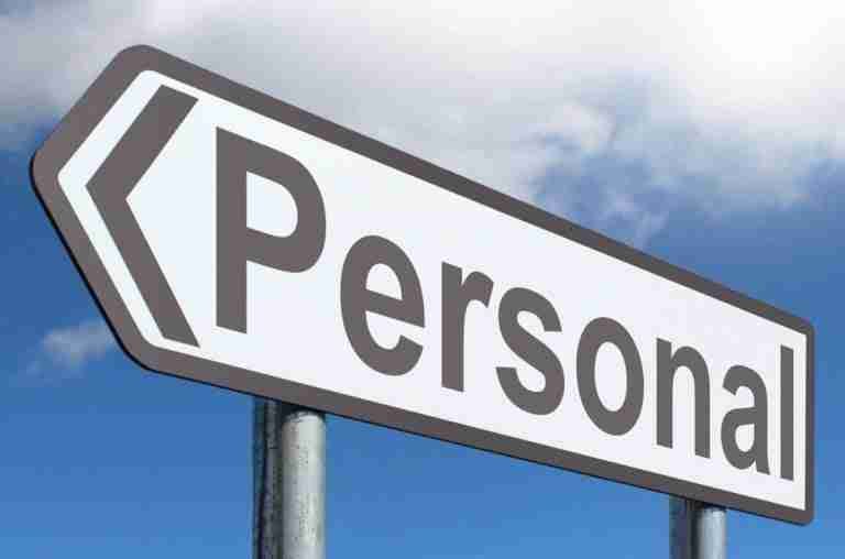 Directional road sign with the word "personal" against a blue sky with clouds. Direct Lenders Bad Credit Personal Loans.