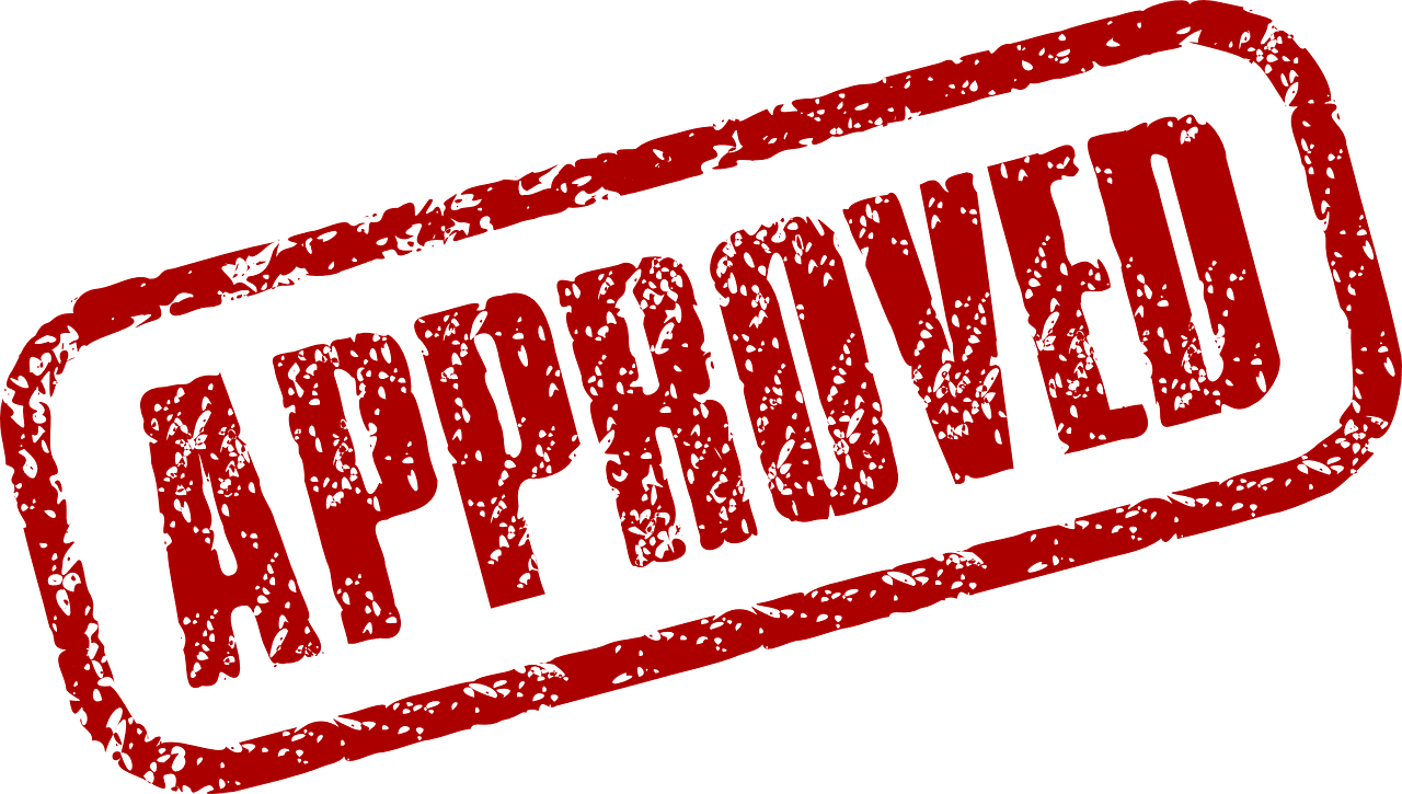 Red "APPROVED" stamp impression on a green background. Approved Loans Bad Credit
