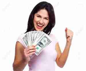 happy girl holding cash and punching the air