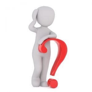 guy leaning on a red question mark