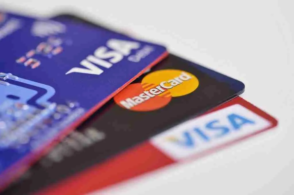 A close-up of a guaranteed approval credit card featuring Visa and Mastercard logos. Guaranteed Approval Credit Card For Bad Credit