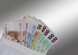cash notes in an envelope