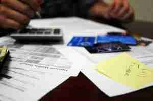 statements credit cards and calculator on desk